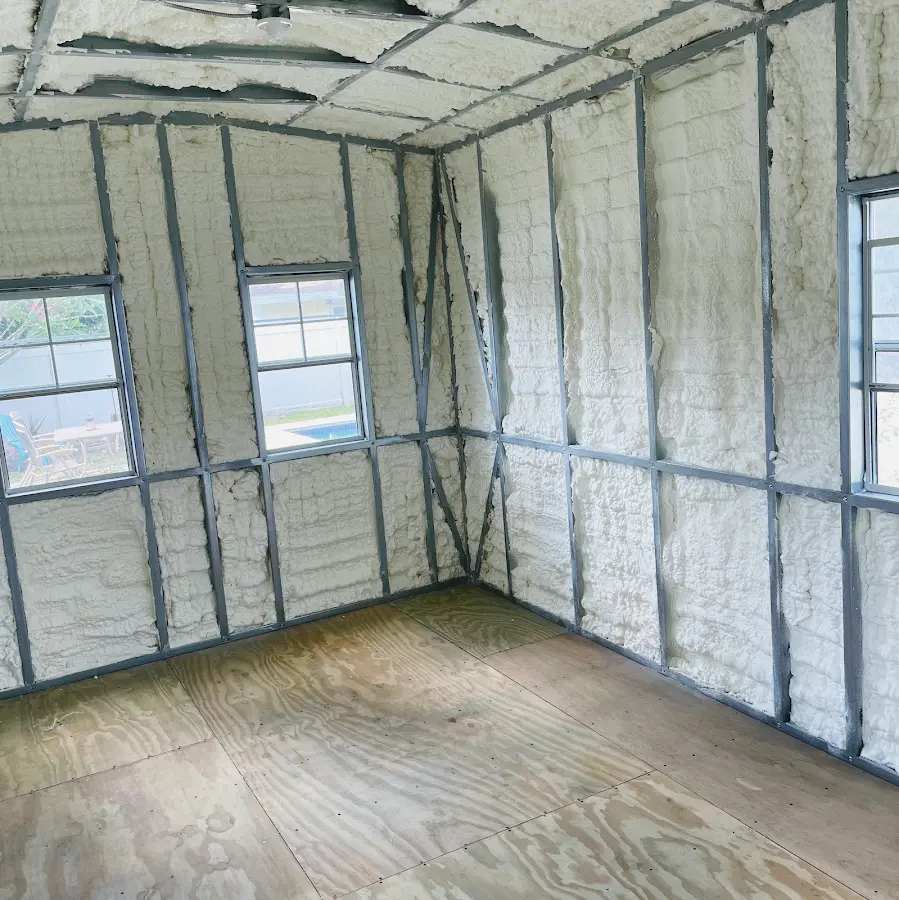 Closed-cell spray foam insulation applied to wall cavities in a residential project in Saddle Brook